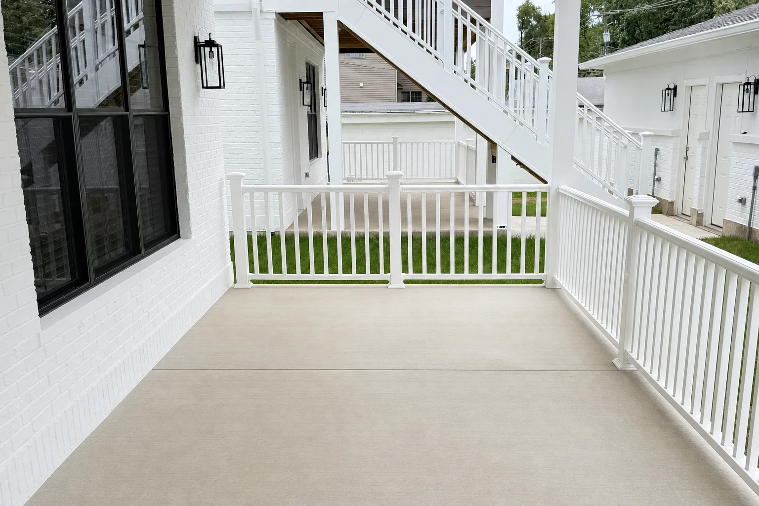 Covered first-floor patio for the lower-level residence at West Street Homes in Naperville