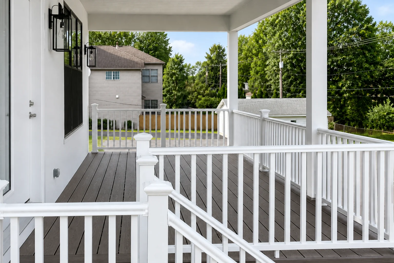 Covered upper-level deck for the upper-level residence at West Street Homes in Naperville